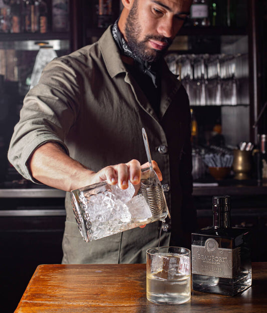 bartender pouring BeauFort vs Gin